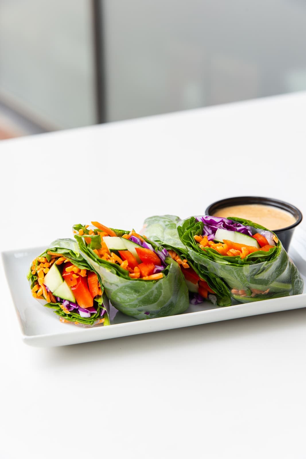 E+ROSE fresh food prepared for catering — colorful, wholesome, real-food dishes